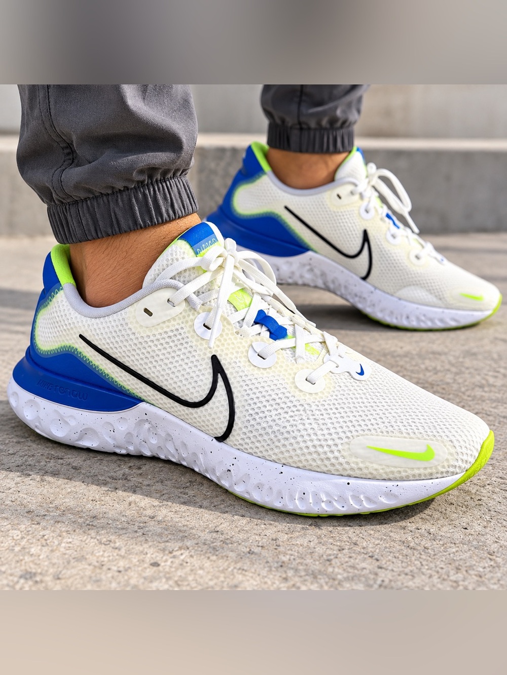 Nike Men's White/Blue React Running Shoes with Neon Accents